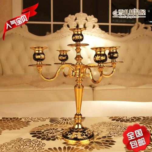 The new shipping senior black rubber Candlestick drop gold-plated metal candlestick Hotel decor Home Furnishing creative style