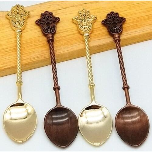 Roman emperor shield gold feather spoon wing retro staff series coffee spoon mixing dessert spoons