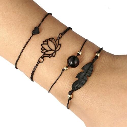 Pack of 4 inspired bangle bracelet with faux pearl and heart /embossed leaf /hollow lotus design in mixed link chains in black