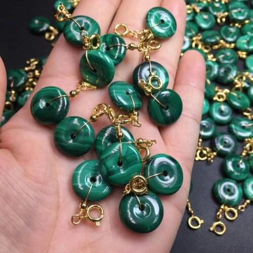 Natural malachite production of safety buckle.Crystalline energy points are used for reiki healing