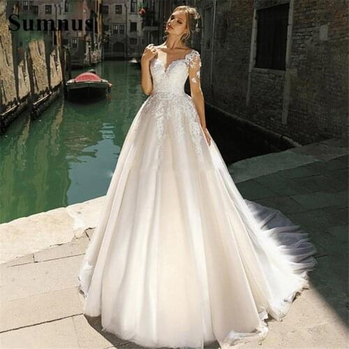 Sumnus A-Line Wedding Dresses 2021 Long Sleeves Appliques Lace Sexy See Through Bridal Gowns Wedding Party Dress