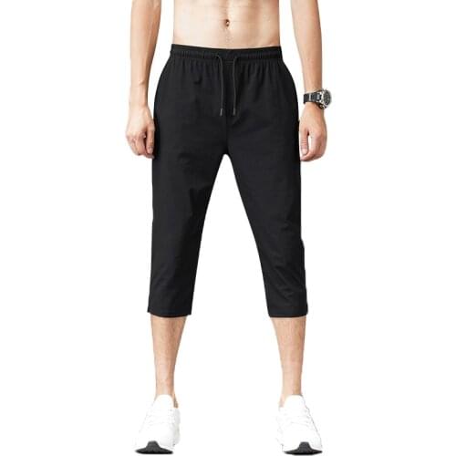 2021 Men Cropped Trousers Casual Pants Shorts Pure Color Elastic Summer Recreation Ultrathin Stretch Loose Hot Pants 5Xl 557