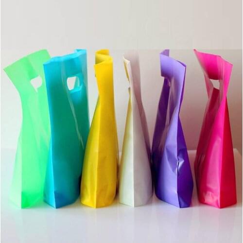 Custom logo / trademark thickening brand new material plastic portable gift bag clothing boutique cosmetics toys childrens pack