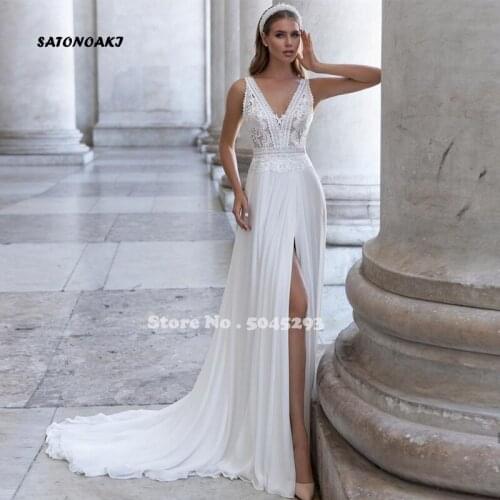 Sexy Deep V-Neck Wedding Dress 2021 Floor Length Lace Appliques Backless Sweep Train Bridal Gowns Robe Mariee Vestidos Undefined