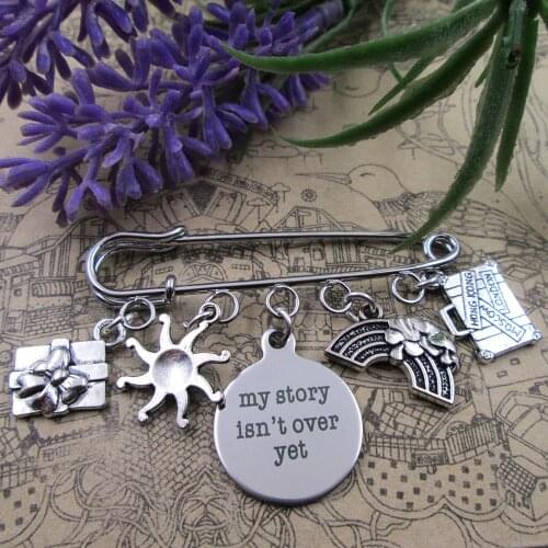 My story isn't over yet travel all the time charm brooch silver plated charm brooch gift birthday