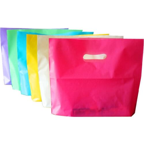 50pcs Color Plastic Shopping Bags with Handle Clothes Gift Packaging Bags Party Favor Bag Candy Wrapping Bags
