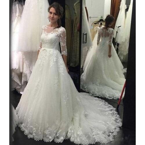 2021 Half Sleeves Elegant Lace Wedding Dresses Sheer Neck Modest Country Bridal Gowns with Buttons Vestido De Noiva