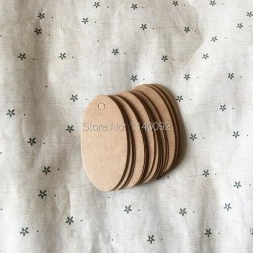 Free shipping blank oval kraft paper tag 3.3x6.5cm/clothing hang tag/garment printed tag/DIY gift labels/price tag 500 pcs