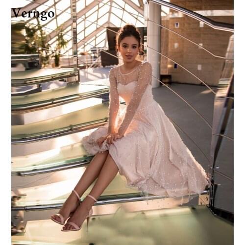 Verngo Modest Blush Pink Full Pearls Short Wedding Party Dress Sheer Long Sleeves Jewel Neck Tea Length Bride Formal Gowns