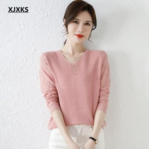 XJXKS Fall 2021 new women hollow sweater fashion V-neck long-sleeved solid color all-match sweater women wool pullover