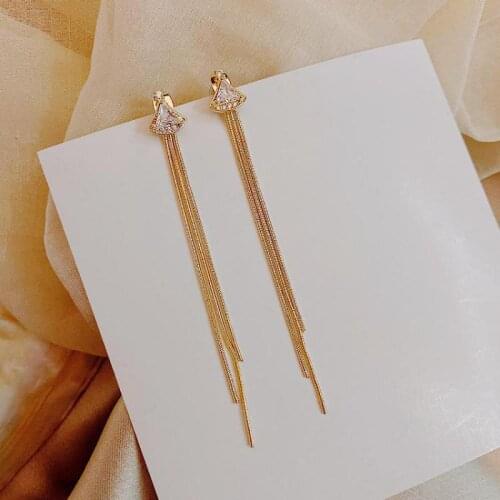 Korean Girl Earrings 2021 Fashion New Triangle Crystal Tassels Cold Wind Simple Long Womens Earrings Manufacturers For Sale