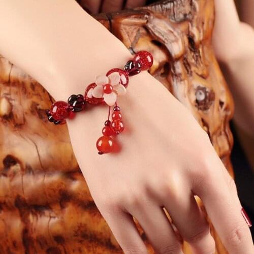 Ethnic wind bracelet female students Korean version of lovely red rope retro wind hand string garnet glass hand ornaments