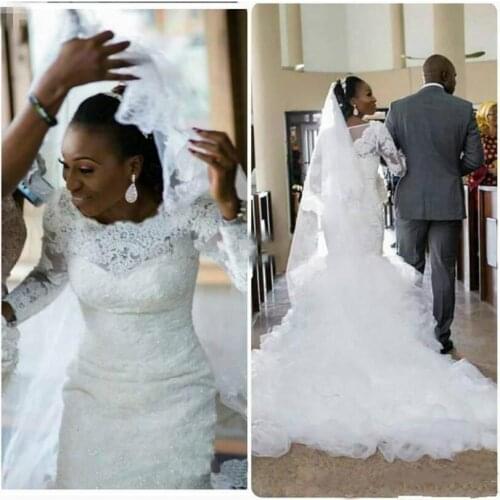 Vintage Lace Long Sleeves White Mermaid Wedding Dresses 2021 Sexy Tiered Ruffles Organza African Modest Wedding Bridal Gowns