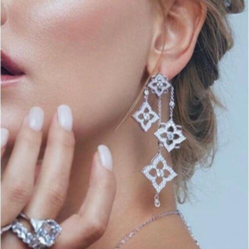 Cross-border hot selling European and American fashion exaggerated luxury earrings Bohemian stars but design wedding party long