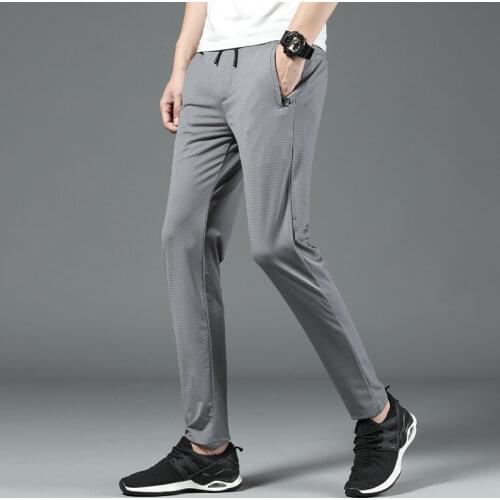 Brand 2020 summer New Thin Mesh Breathable Casual Pants Men Slim Fit Fashion Trousers Male Brand Clothing Plus Size 28 33 36 38