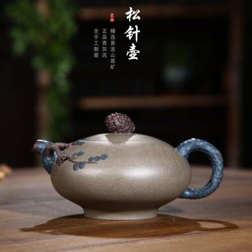 Yixing Zisha tea set a hand-made tea pot made of raw ore, green plaster and pine needle