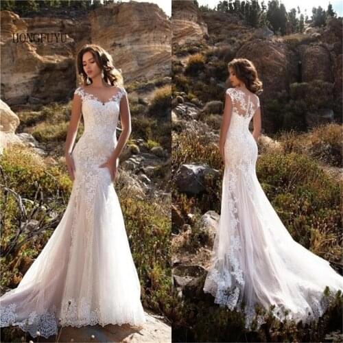 Robe de soirée de mariage Mermaid Wedding Dresses 2021 Open Back Wedding Gowns Lace Appliques Bride Gowns
