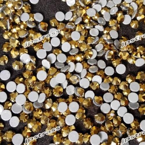 Free shipping !! SS 16 size 4mm Hot fix rhinestone gold color for arabic wedding dress 1440 pcs each pack