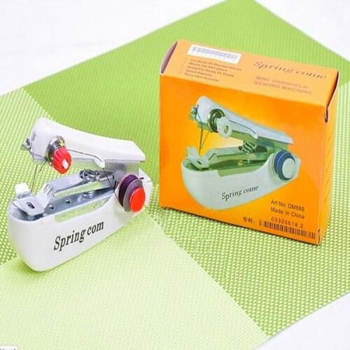 Hot Selling New creative household Mini Handheld Portable Clothes Fabrics Sewing Machine Free shipping