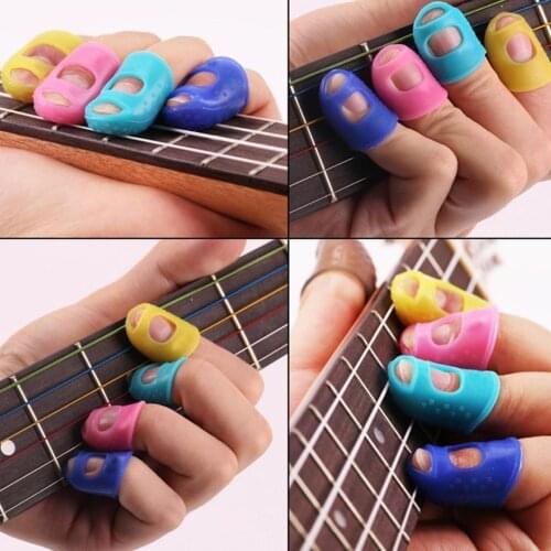 5Pcs Silicone Guitar Thumb Finger Picks Protector Plectrum Fingertip thimble Finger Guard safety protect caps Colors Random