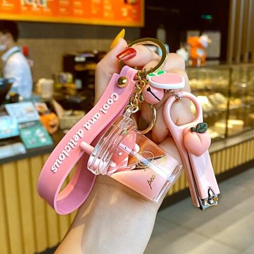 Cartoon Peach Crystal Milk Tea Cup Keychain Cute Fluffy Ball Floating Key Pendant Girl Net Red Packet Mobile Phone Pendant