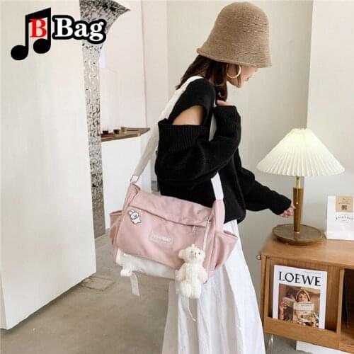 Japanese Harajuku simple style large capacity make-up bag Korean version campus student cartoon cute bear pendant messenger bag