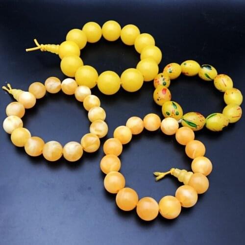 Imitation beeswax bracelet round beads 14 mm hand string beeswax fluorescent beeswax ambe lovers hand string hot sale