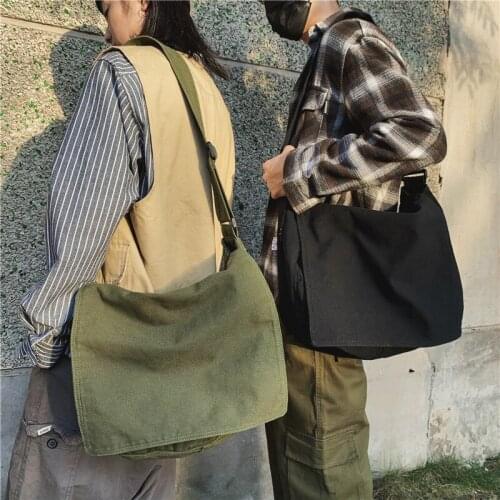 The new Japanese street trend diagonal bag men and women retro canvas bag shoulder bag student backpack satchel hand bags purse