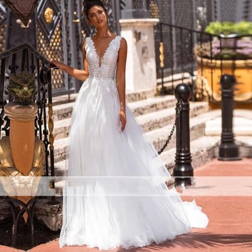 Sexy V Neck Sleeveless Wedding Dress Bridal Gowns Backless Appliques Lace Bride Dresses Tulle vestidos de noiva Floor Length