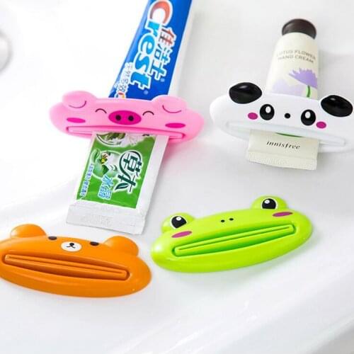 HOT Bathroom Home Tube Rolling Holder Squeezer Easy Cartoon Toothpaste Dispense