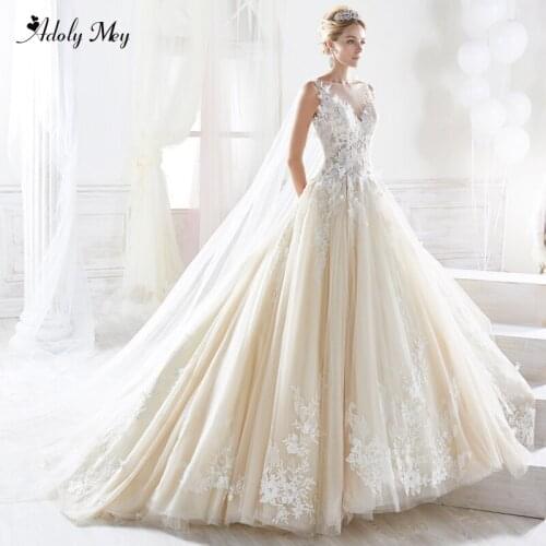 Adoly Mey Charming Scoop Neck Button Tulle Court Train A-Line Wedding Dresses 2020 Luxury Beaded Appliques Princess Bride Gown