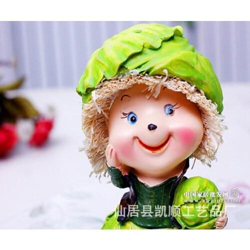 Spot wholesale and retail cabbage couple sets of two colored resin hanging foot doll YG-9821
