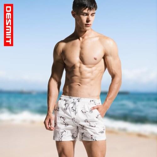 2018 Beach pants elastic loose shorts tide printing speed dry beach large size swimming trunks