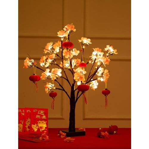 New years day, new years day, spring festival decorations, luminous creativity, peach blossom tree, indoor desktop counter