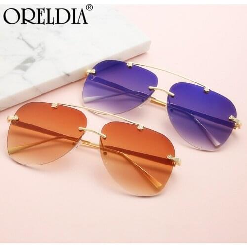 2021 Latest Ladies Sunglasses Oval Rimless Frog Mirror Fashion Ladies Gradient Color Glasses Metal Temple Sunglasses Men UV400