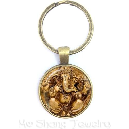 2018 New Classic 25mm Ganesha Buddha Elephant Glass Dome Keychains Handmade Men Jewelry Car Key Holder Souvenir For Gift