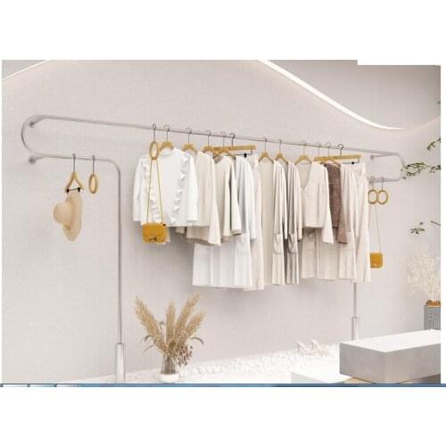 Stainless steel clothes rack hanging on the wall
