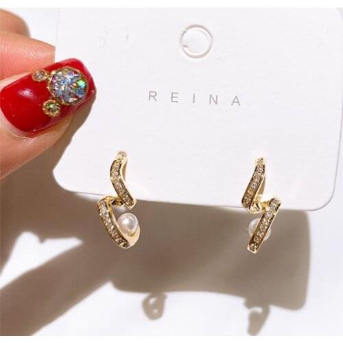 The new Korean temperament spiral earrings, exquisite simple and cold wind earrings earrings earrings