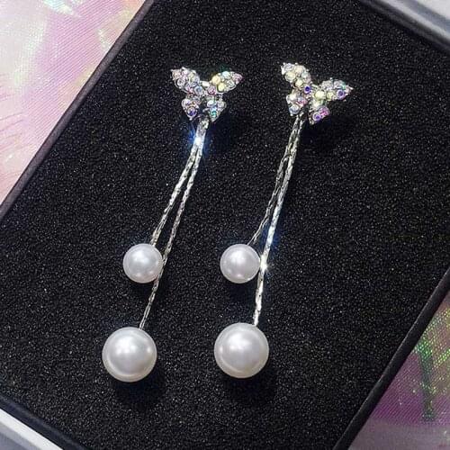 Bow knot ear nail feminine temperament long Pearl pendant ear pendant personality catapult ear nail jewelry