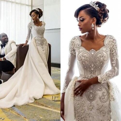 African Long Sleeves Lace Mermaid Wedding Dresses Scoop Lace Applique Beaded Crystals Over Skirts Court Train Wedding Bridal