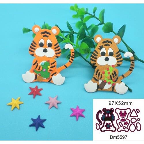 Tiger cutting template holding Christmas tree for metal cutting of DIY scrapbook, used for card making, embossing crafts