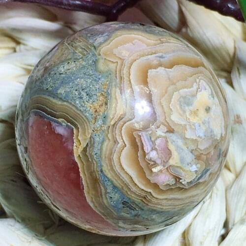 Red wen stone sphere