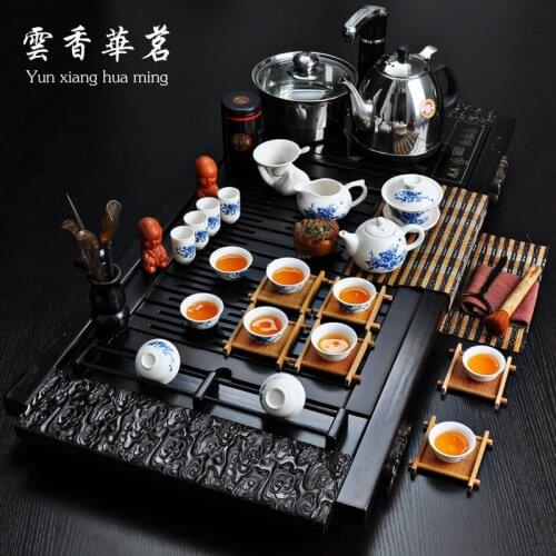 Ceramic tea set special set of Kung Fu tea three or four in one electromagnetic oven tray wood