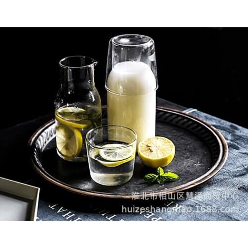 Japanese style one-person teapot with a single heat-resistant glass teapot, a pot, a cup of milk, a cup of coffee mugs teacup