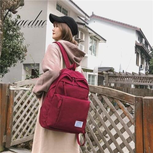 Qiaoduo Classic waterproof nylon women backpack Large capacity multiple zip pocket Backpacks Travel bag Teenage Girls Schoolbag