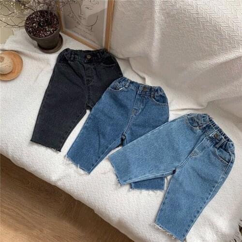 2020 autumn new boys and girls Japanese and Korean style simple personality raw edge leg casual all-match jeans