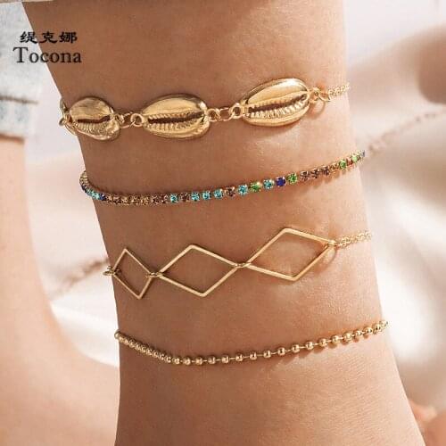 Tocona 4pcs/sets Colorful Rhinestone Foot Chain Gold Color Shell Hollow Geometric Alloy Metal Summer Jewelry Accessories 17535