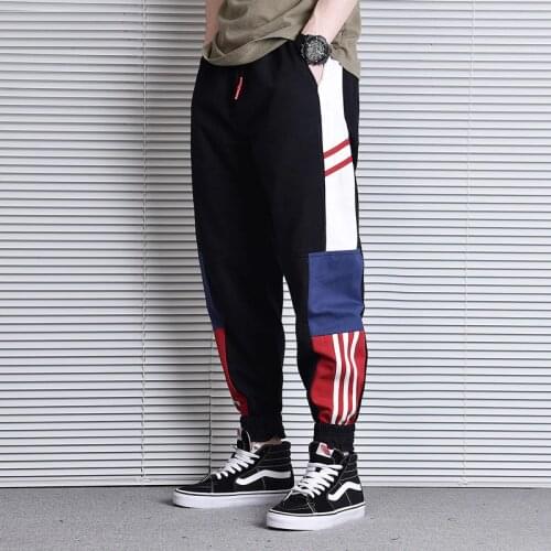 2021 Streetwear Men Jeans Loose Fit Spliced Casual Cargo Pants Homme Stripe Designer Harem Trousers Hip Hop Joggers Pants Men