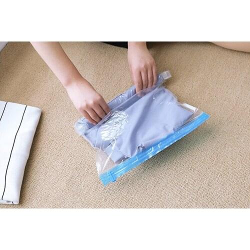 Closet organizer bag Portable Manual vacuum packaging bag, convenient clothing storage bag