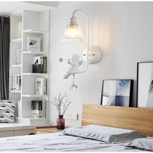 Modern wall light E14 resin child blowing horn bird bedroom bedside wall lamp led crystal glass lampshade wall lamp